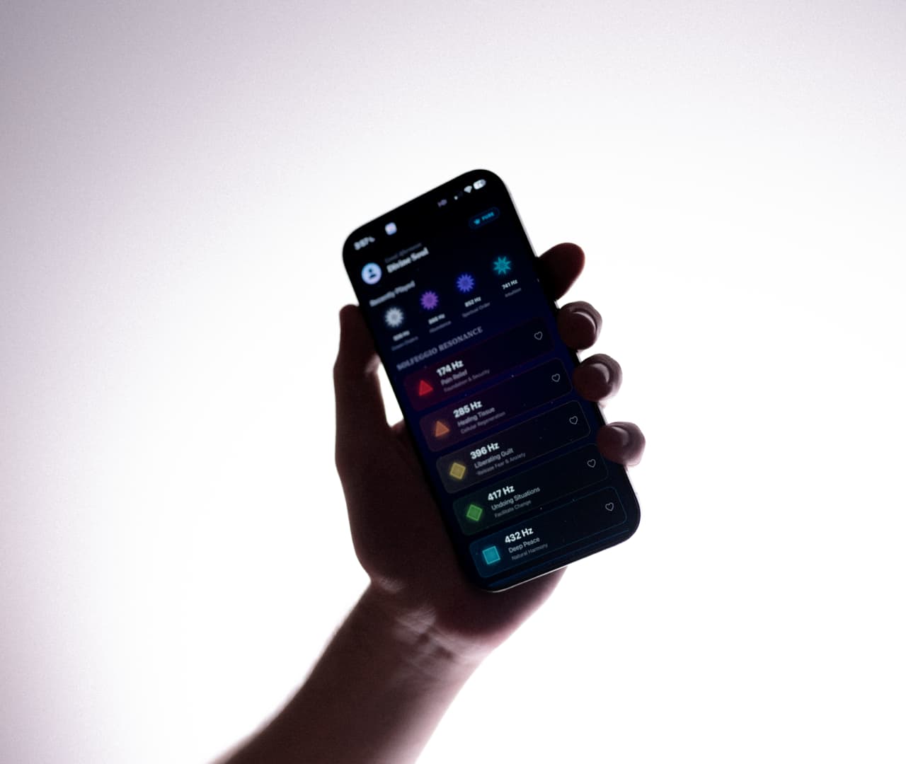 SelfLoveapp frequency library held in a hand